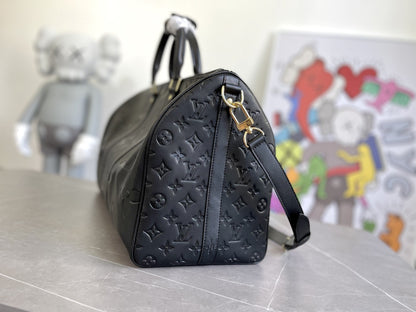 KEEPALL 45 BANDOULIERE MONOGRAM EMPREINTE GIANT