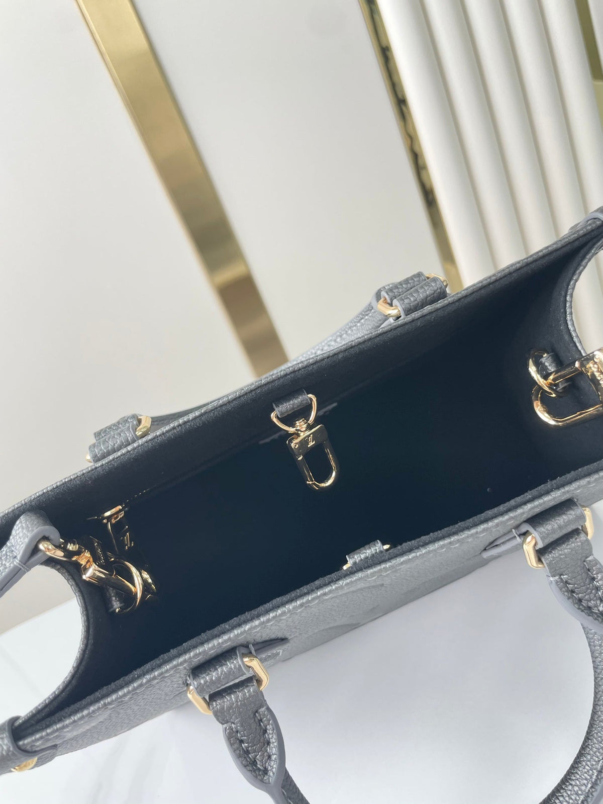 ONTHEGO PM 25 IN GUN METAL EMBOSSED CALFSKIN