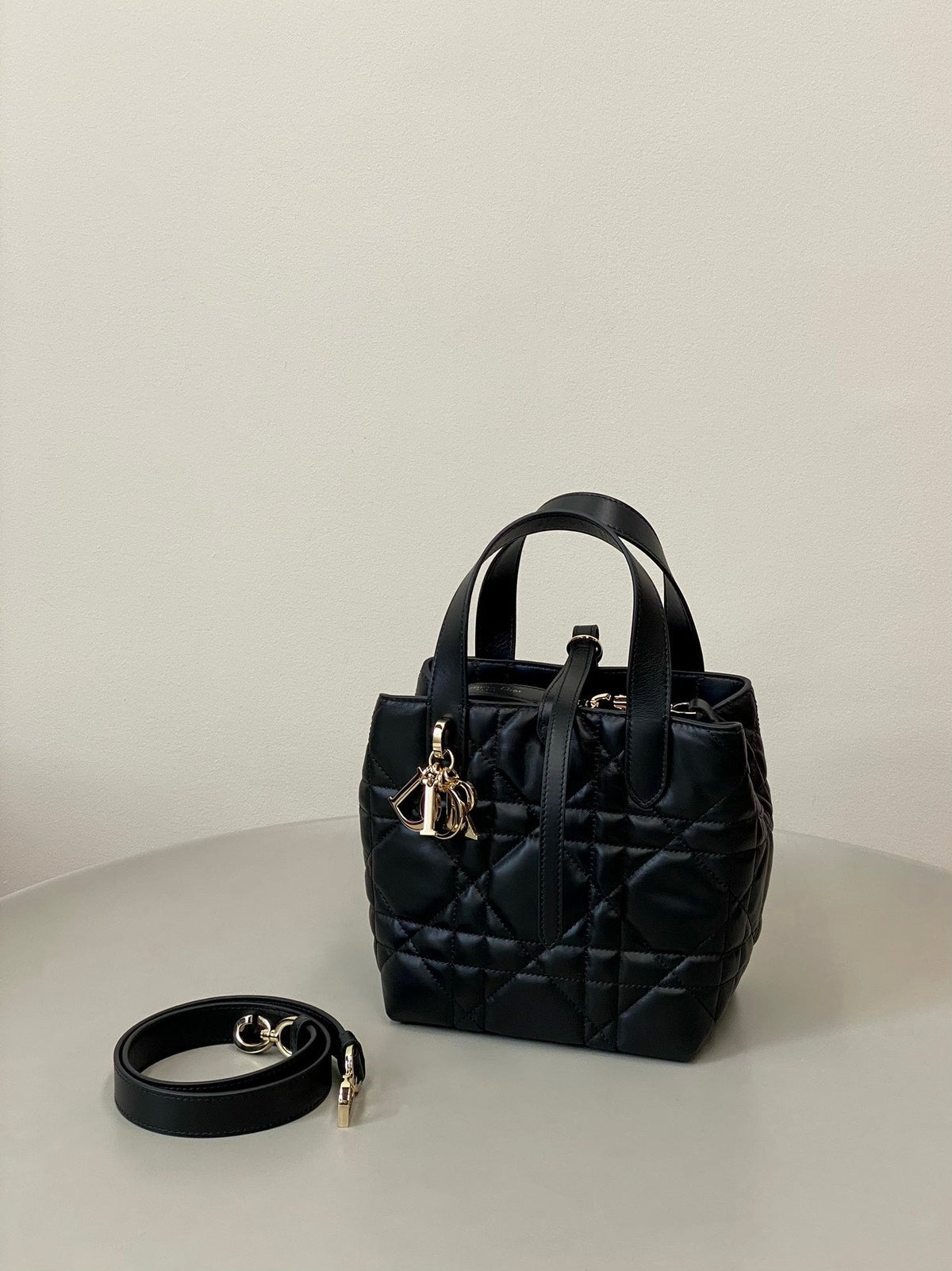 MINI TOUJOURS BUCKET BAG 18 IN BLACK CANNAGE CALFSKIN
