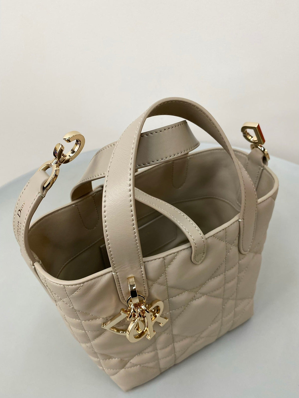 MINI TOUJOURS BUCKET BAG 18 IN BEIGE CANNAGE CALFSKIN