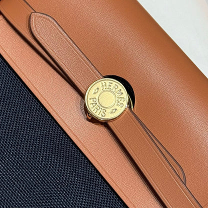 HERMES 25S MINI HERBAG 20 IN NAVY BLUE CANVAS GOLD HARDWARE