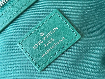 KEEPALL BANDOULIÈRE 50 IN GREEN MONOGRAM HERITAGE CANVAS