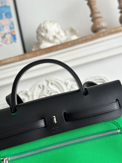 ZIP CABINE 31 BAG IN EMERALD GREEN CANVAS AND BLACK CALFSKIN