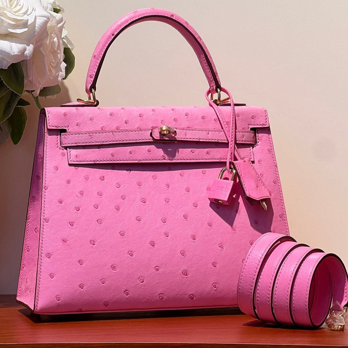 KELLY SELLIER 25 BAG IN DOLL PINK OSTRICH LEATHER WITH GOLD HARDWARE (MADE-TO-ODER)